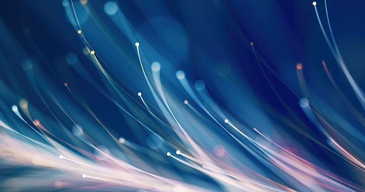 Strands of fiber optic connections on a blue background