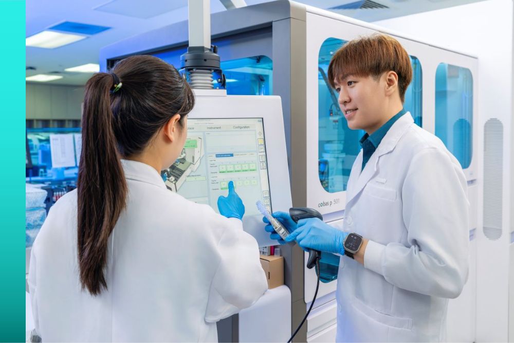 Lab technicians using LIS technology to automate diagnostics and improve care.