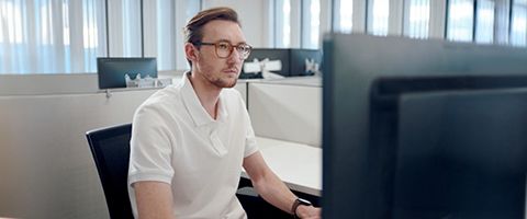 Businessperson working on desktop