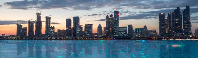 Straight ahead view of a city scape reflecting off the water