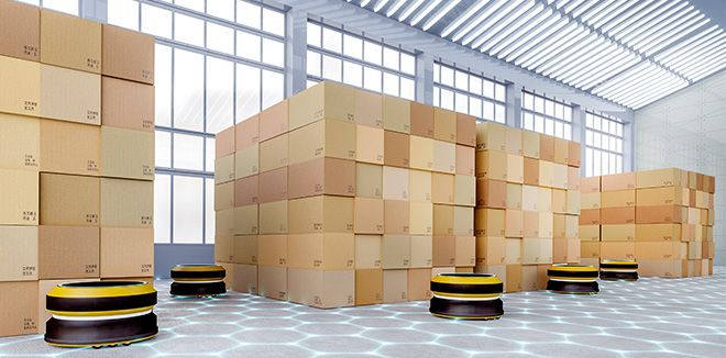 A warehouse space filled with boxes near floor robots
